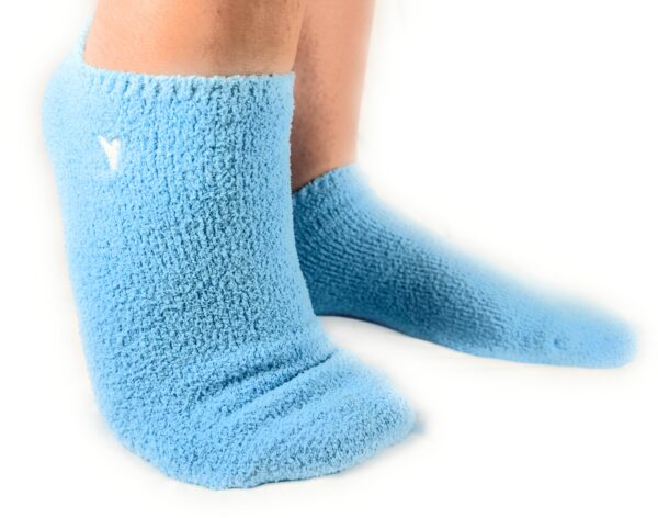 Cozy Women’s Fuzzy Ankle Socks in vibrant blue, made from ultra-soft fleece for ultimate comfort and warmth.